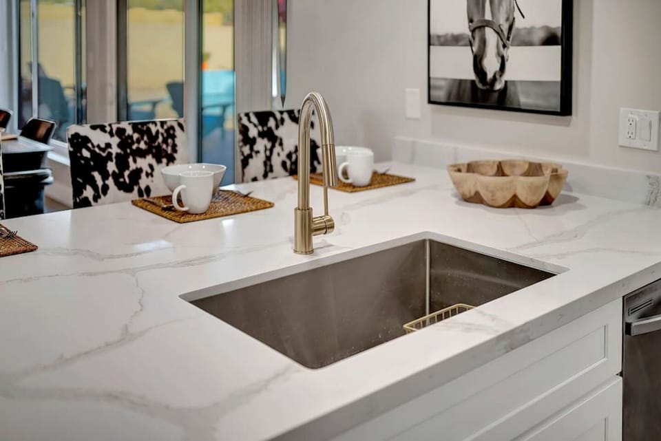Pristine kitchen sink and island bar
