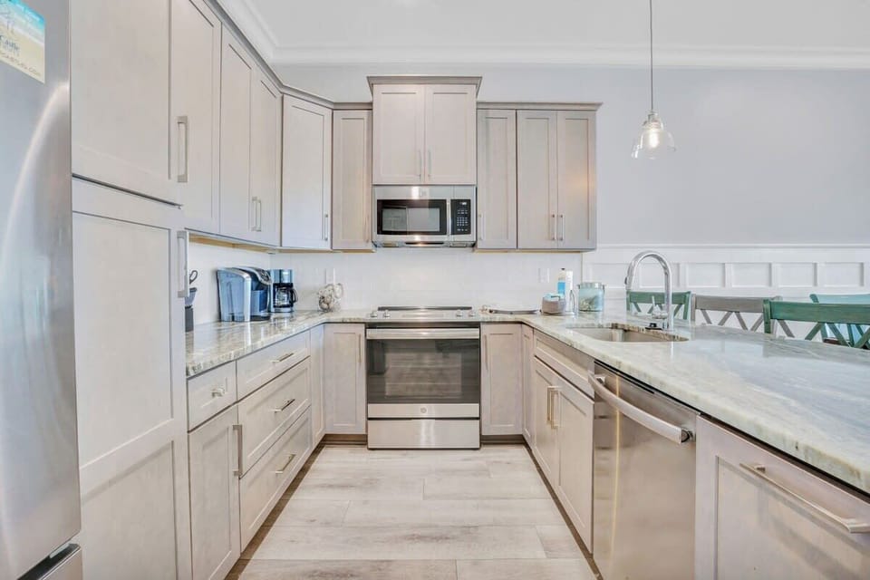 Well-equipped kitchen offering a Keurig and a regular drip coffee maker. 