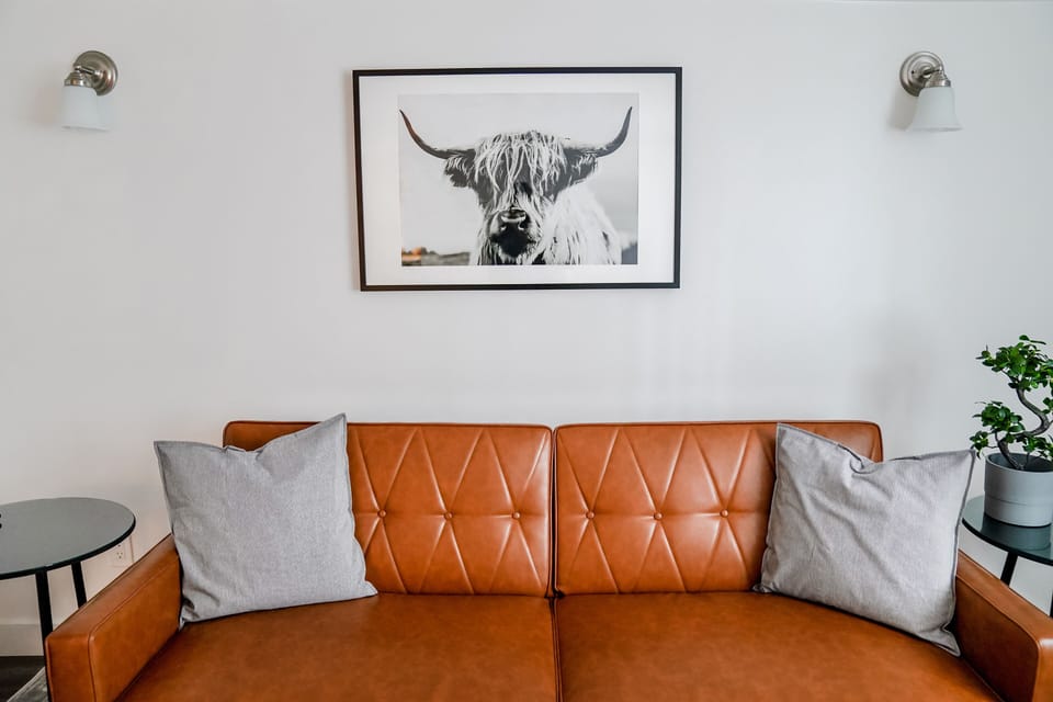 Couch becomes a comfortable flat futon bed and extra linens are provided. 