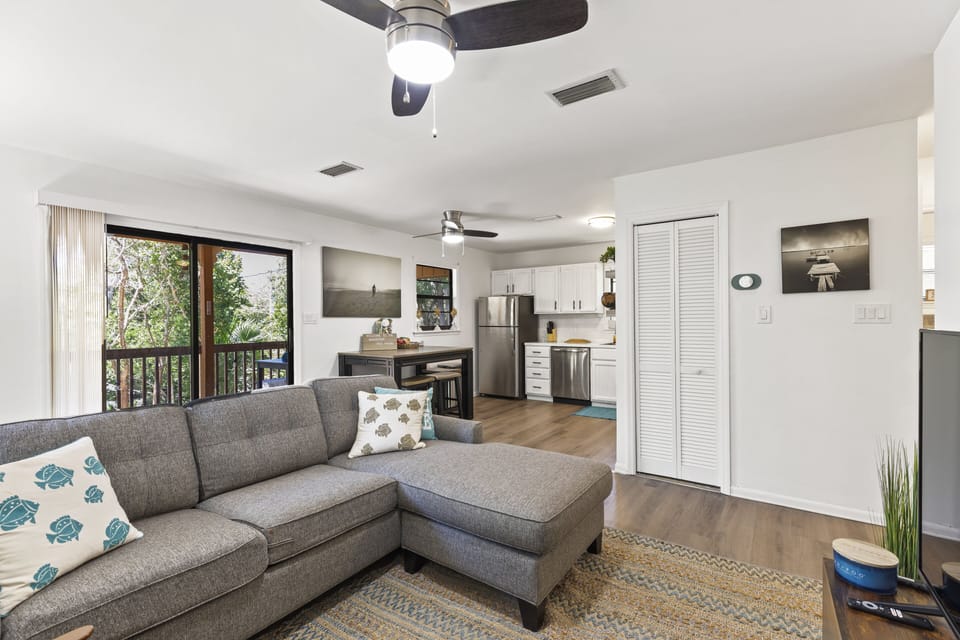Living room area with a 55" Smart TV