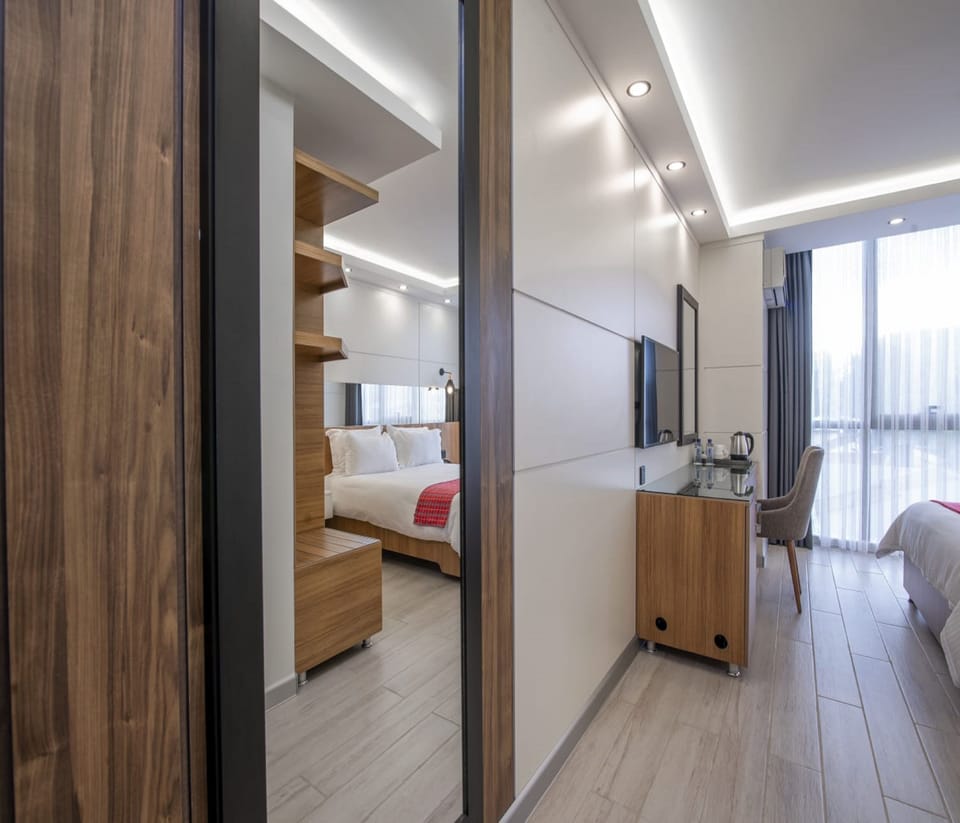 Superior Double Room, 1 Queen Bed, City View | Living area | 42-inch Smart TV with satellite channels, TV