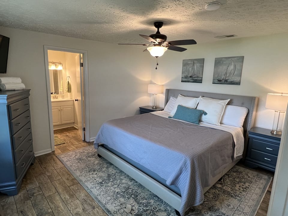 Master bedroom with king-sized bed. 