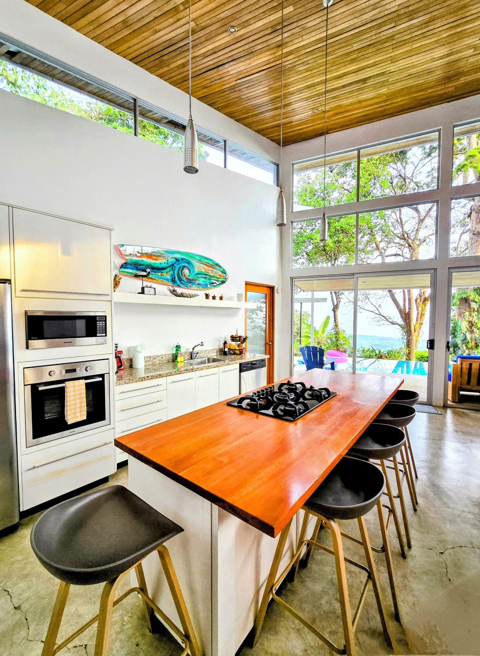 Modern bright fully stocked kitchen.
