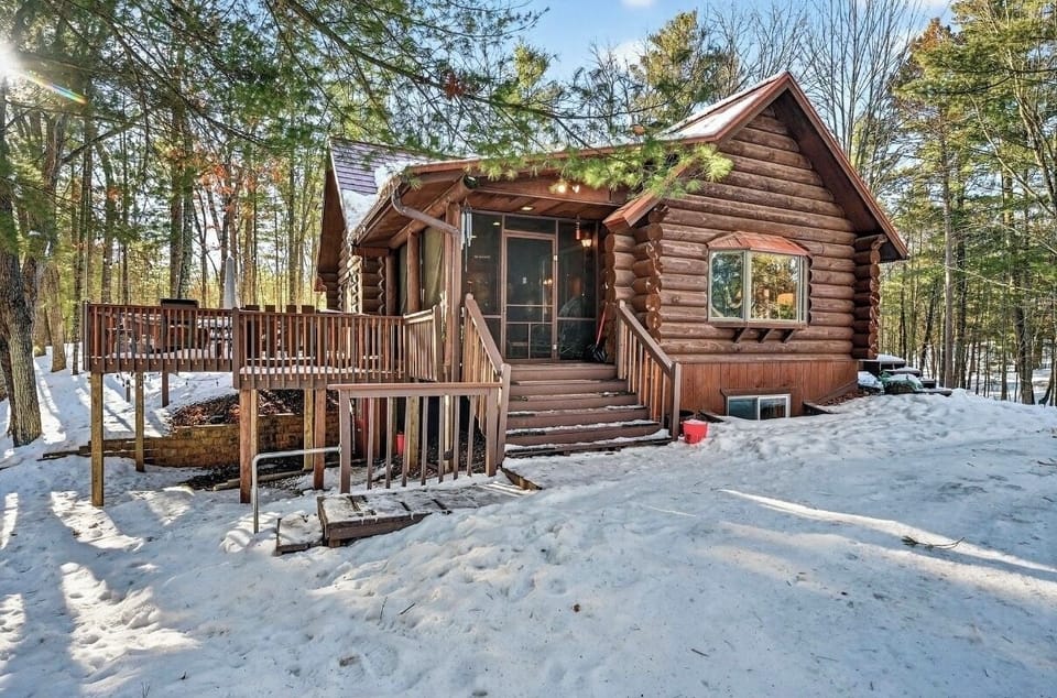 Screened porch entry, large deck, surrounded by views and trails 