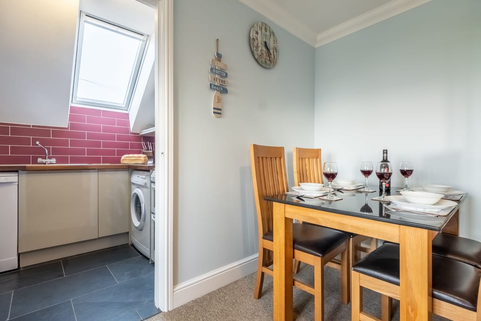 Dining area leading in to kitchen