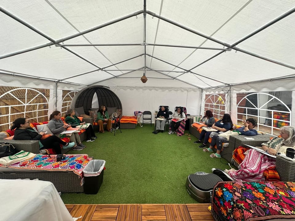 Spacious covered outdoor lounge with colorful seating for groups