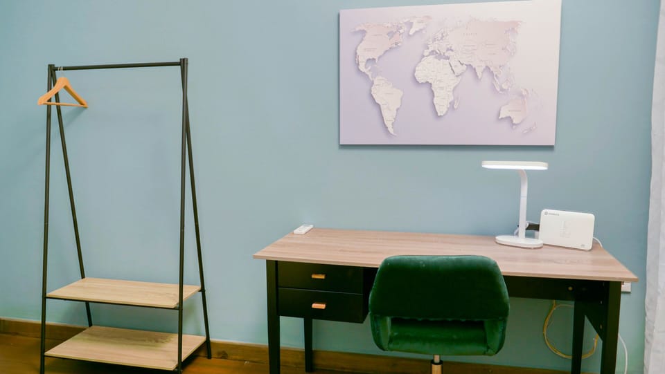 Clothes hanger next to a working area