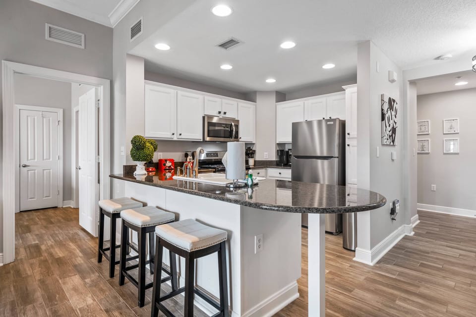 Prepare a delicious meal in the fully furnished kitchen