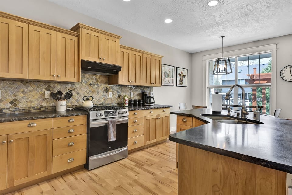 Kitchen with gas stove and large island