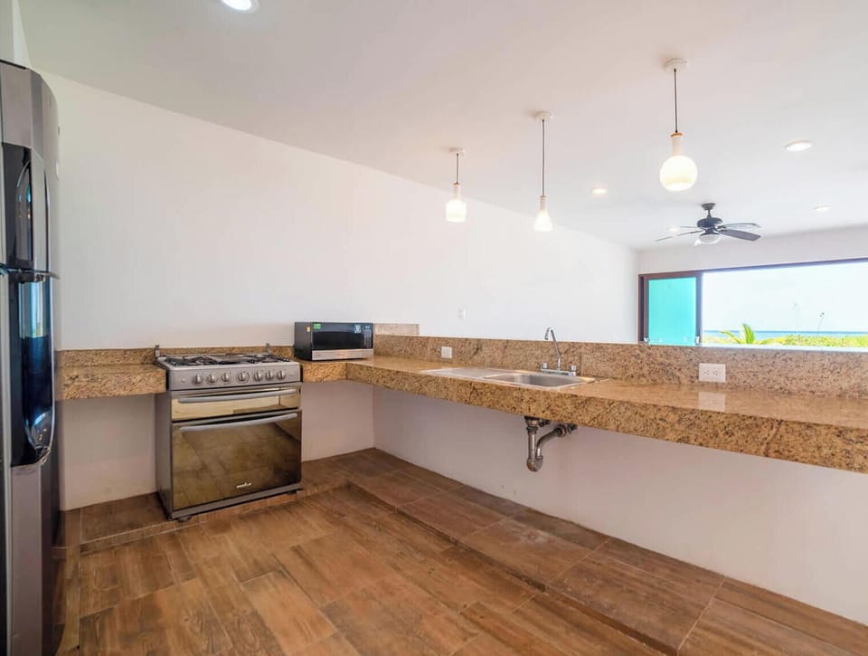 A spacious and fully equipped kitchen with everything you need to cook your favorite meals.