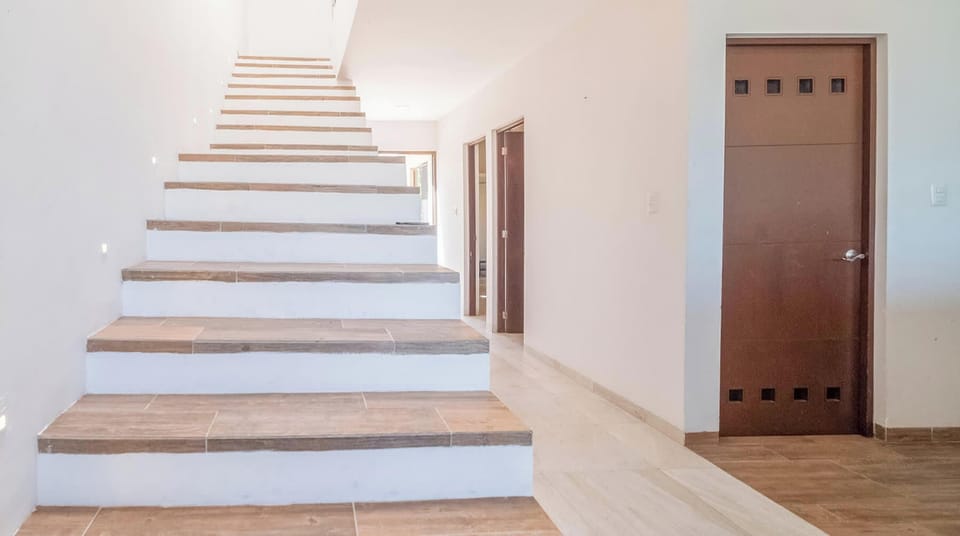Stairs to the upstairs bedrooms.