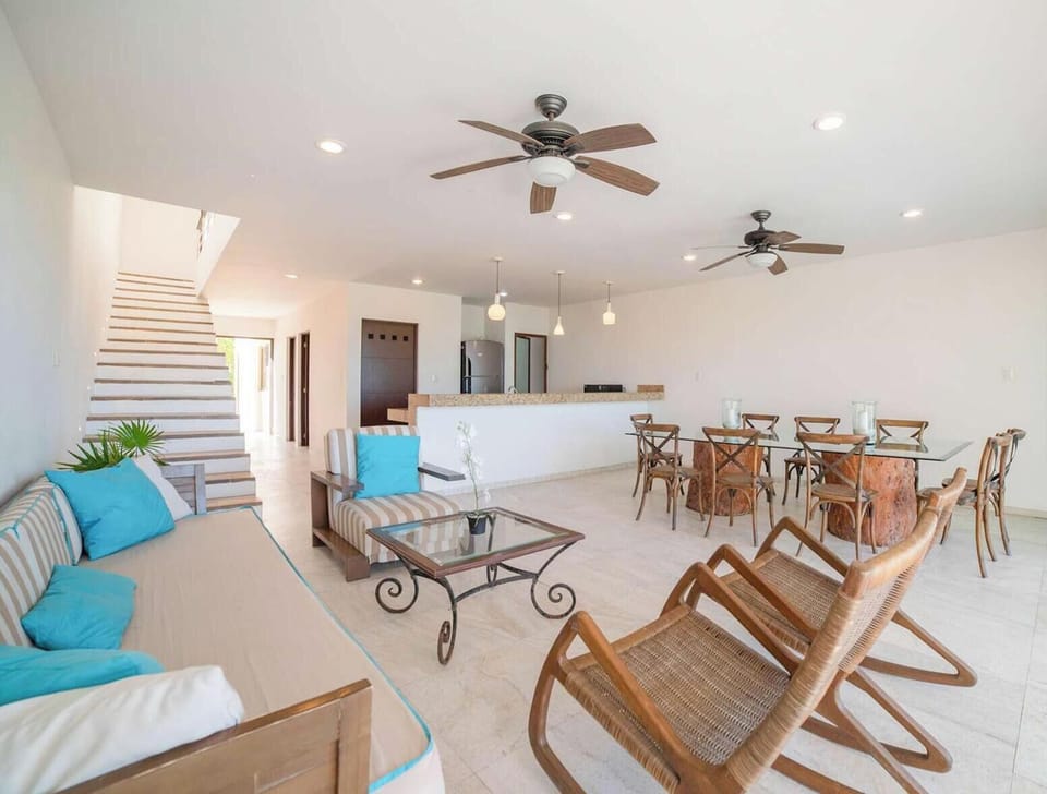 Unwind in this cozy yet spacious living area, where you can enjoy ocean views.