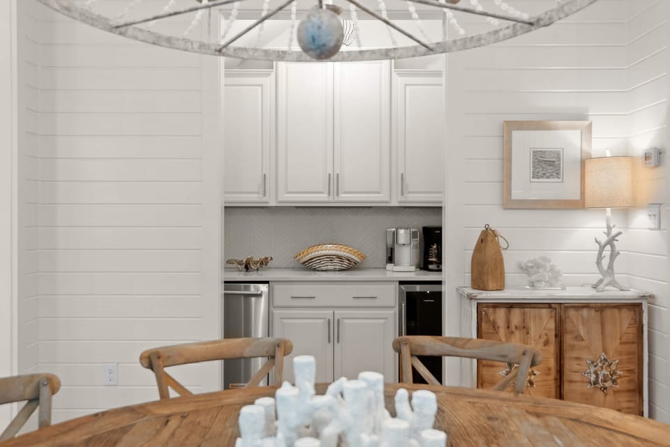 Separate built-in buffet area with mini-fridge and ice maker
