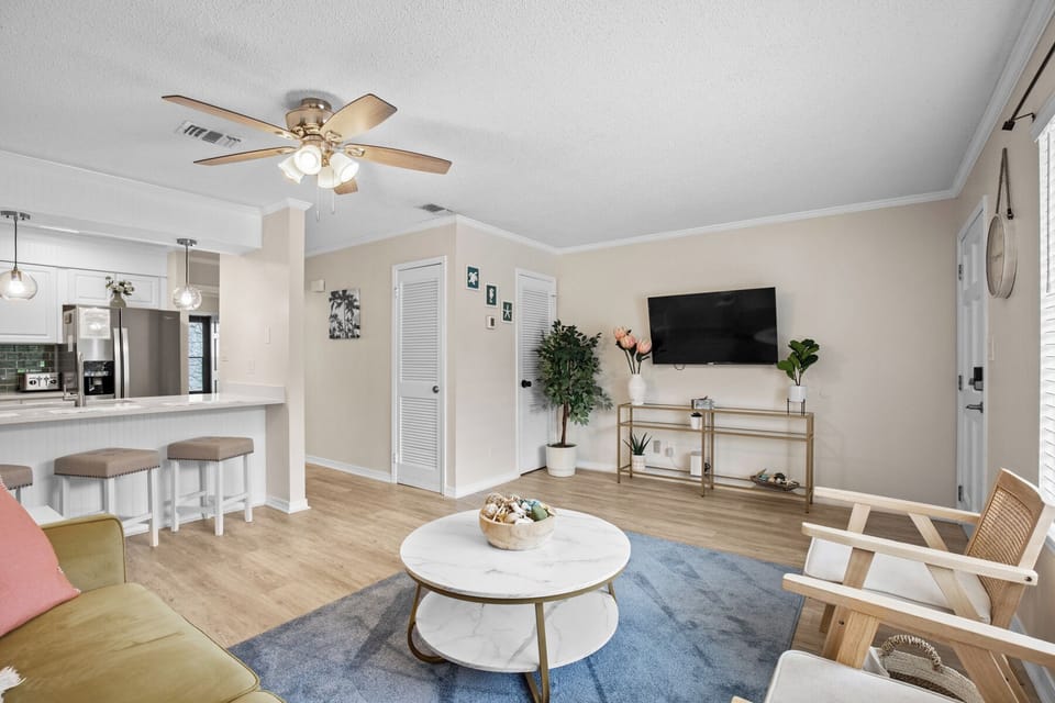 gather all around and relax in the living room with brand new flooring