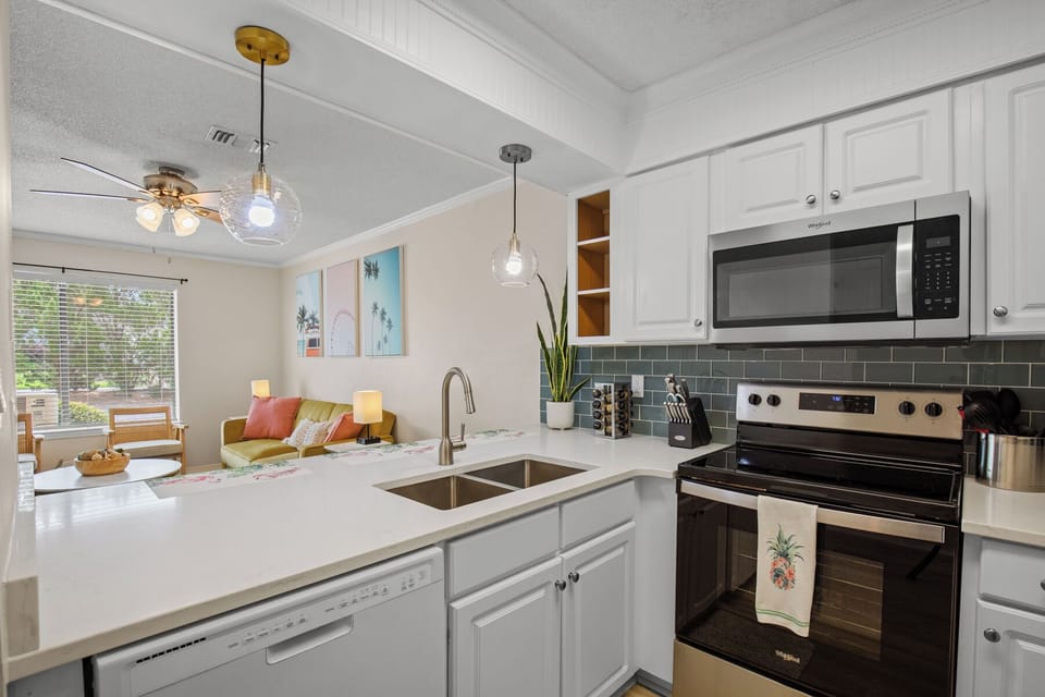 all new counter tops and backsplash tile