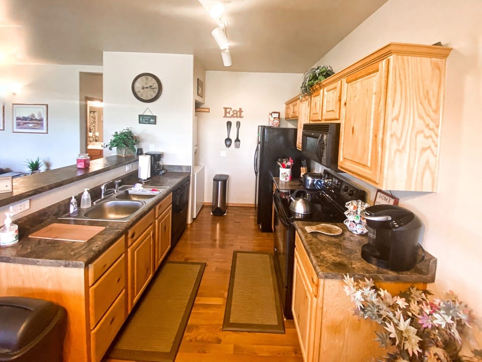 Kitchen
all Dining amenities, and more, in the cabinets