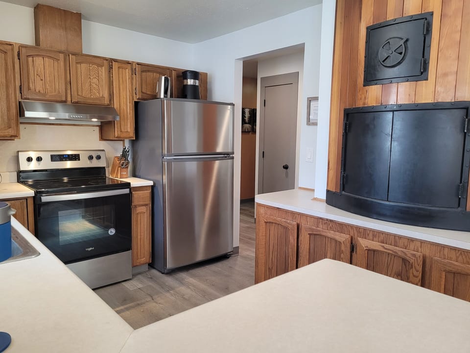 Kitchen with old Pipeline pizza oven.