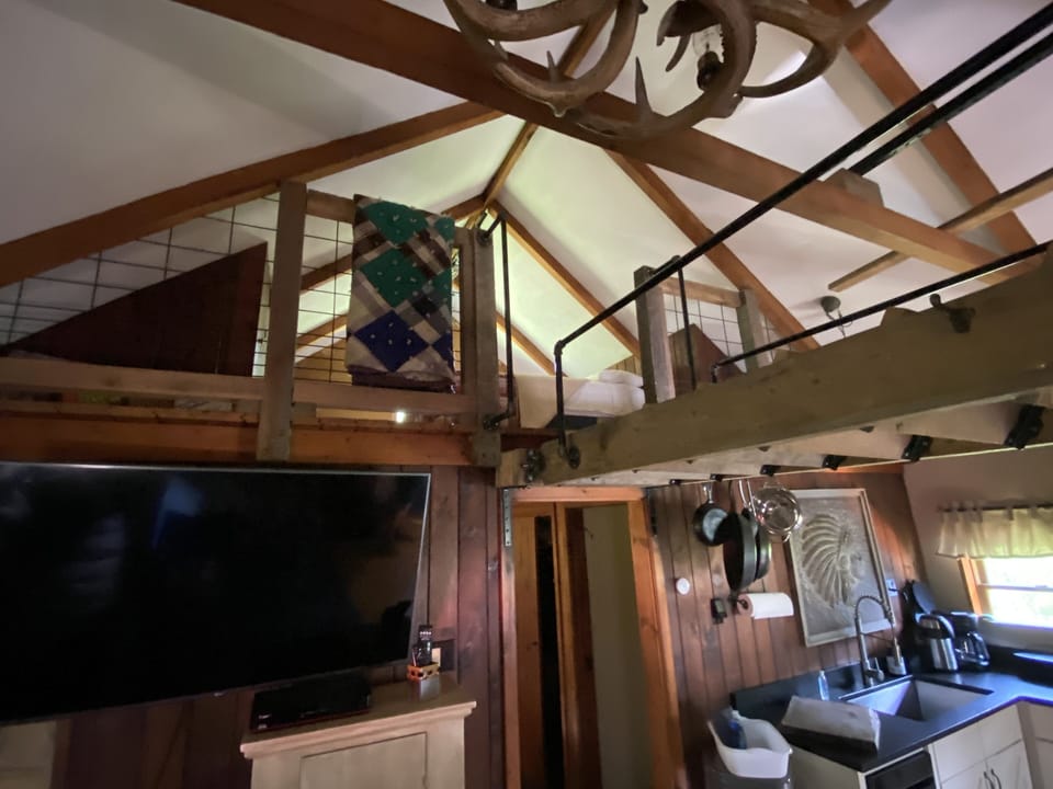 Loft bedroom with a double bed.