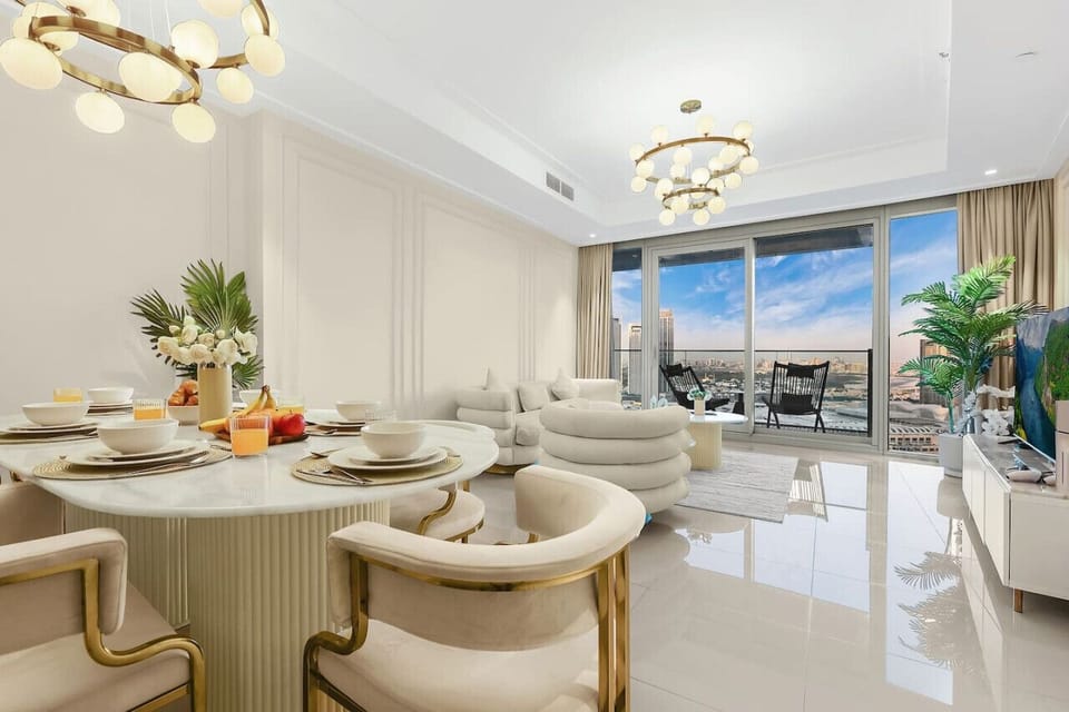 Dining Area: Dine in style with chic chairs, a stunning view, and elegant decor!