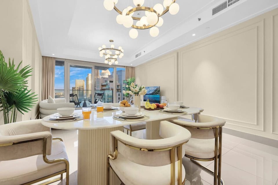 Dining Area: Dine in style with chic chairs, a stunning view, and elegant decor!