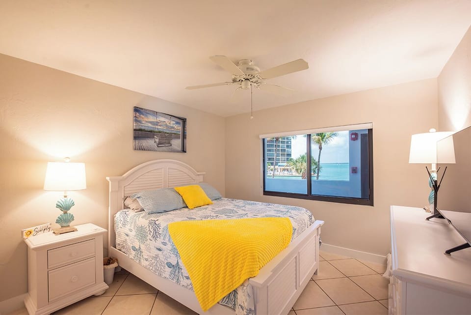 Guest Bedroom has a Queen Sized Bed and offers comfortable accommodations for your guests with a view of the Bay