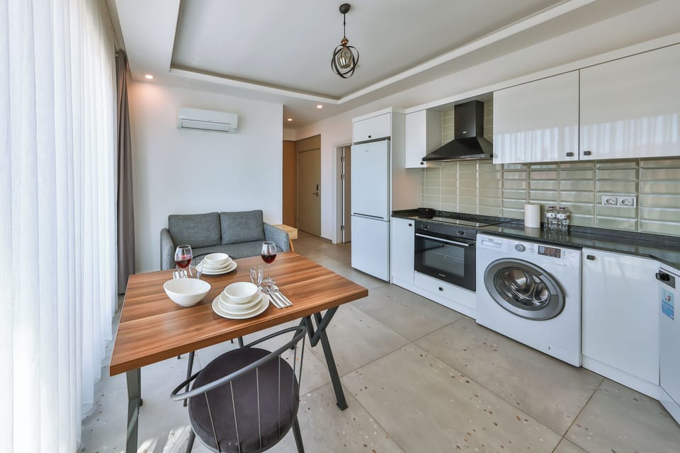 Ground Floor 1+1 Apart with Terrace and Sea View | Private kitchen | Full-size fridge, oven, coffee/tea maker, electric kettle