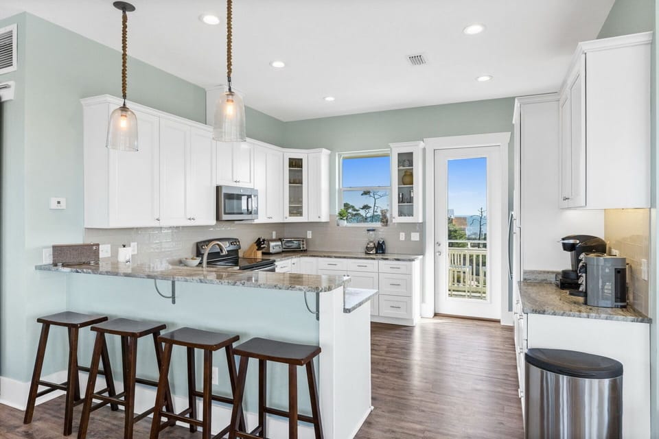 Kitchen - There is a back deck off of the kitchen facing the pond and gorgeous views of the bay.