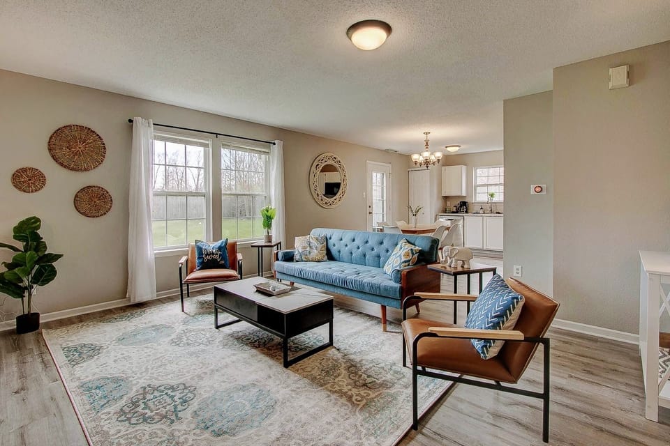 The couch has been updated from the one in this picture to a plush velvet couch.