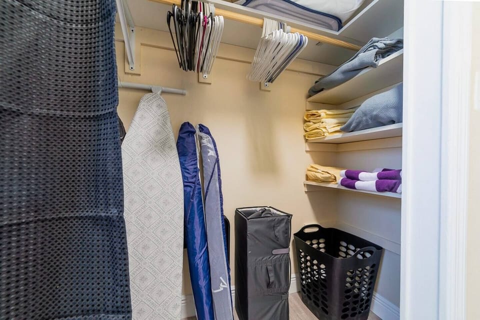 Spacious closet with spare sheets & towels, beach gear, and pack-n-play crib.