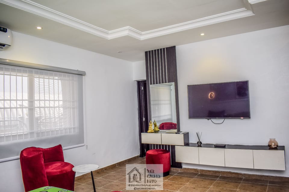 Apartment | Living area | 30-inch TV with digital channels