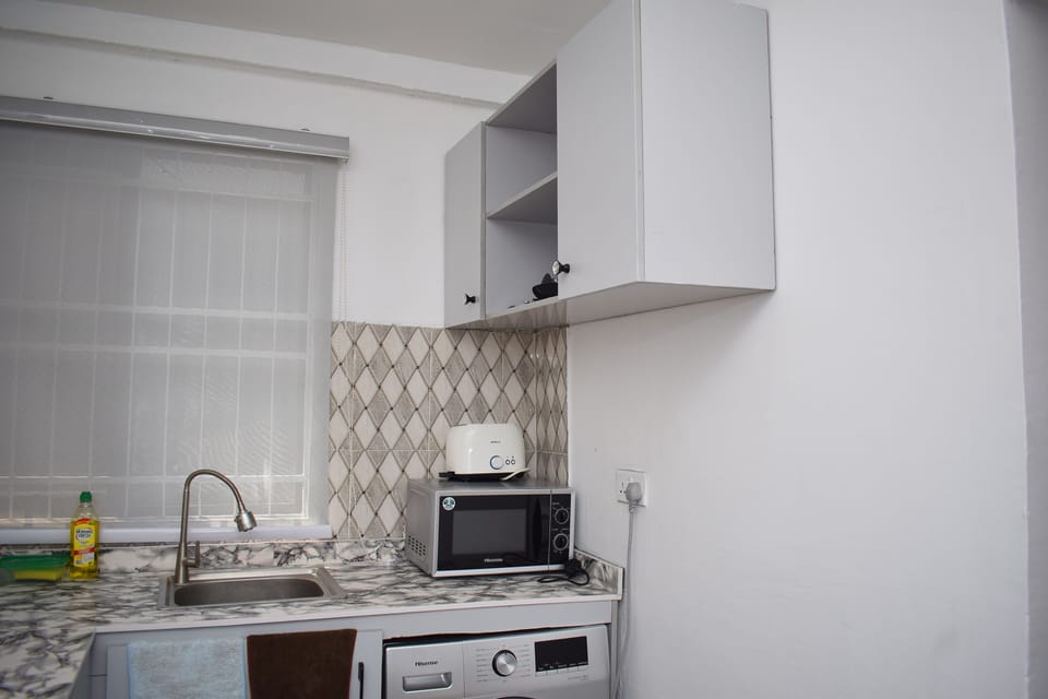 Apartment | Private kitchen | Fridge, microwave, oven, stovetop