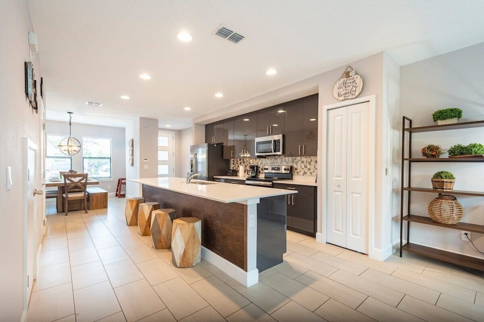 Fall in love for modern luxury with our stunning open kitchen—a beautiful, vibrant space that seamlessly combines style and functionality. a family-friendly retreat where the joy of cooking meets the warmth of togetherness.