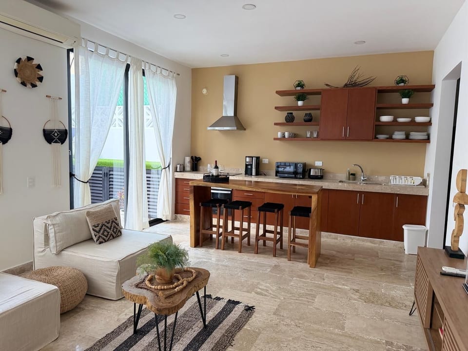 Equipped kitchen steps from BBQ & non-heated jacuzzi area