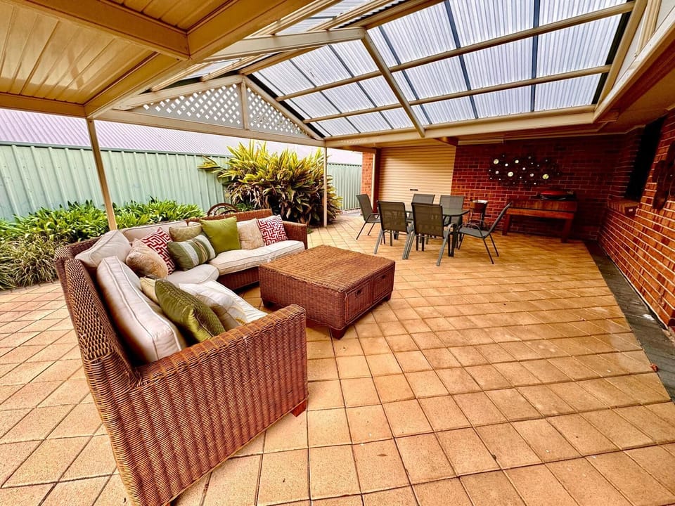 Large patio with lounge, dining and BBQ