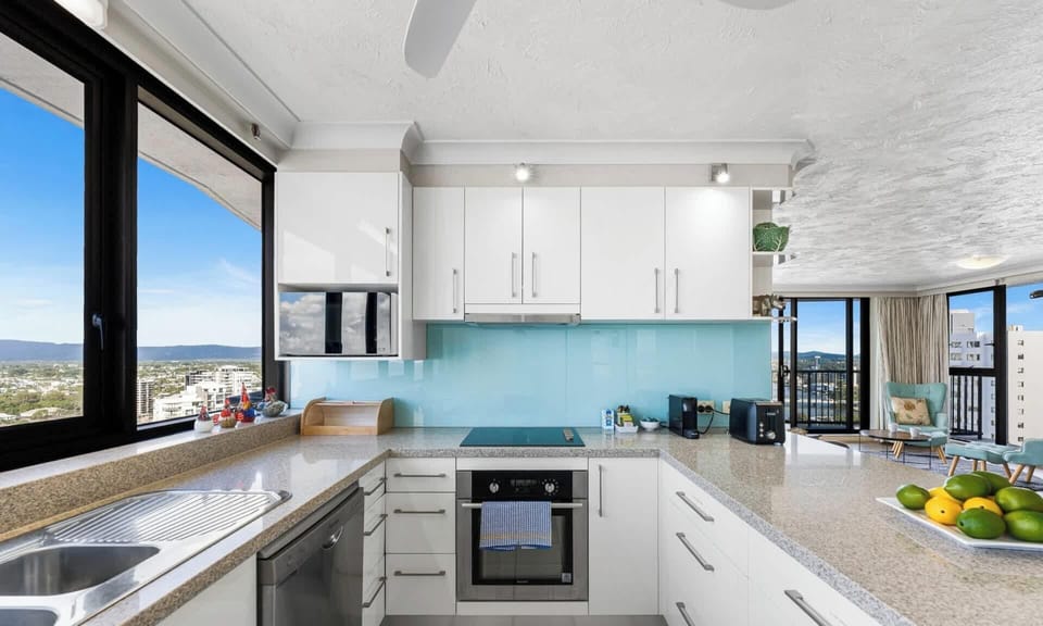 Expansive 'U' shaped kitchens with views down coast and to hinterland