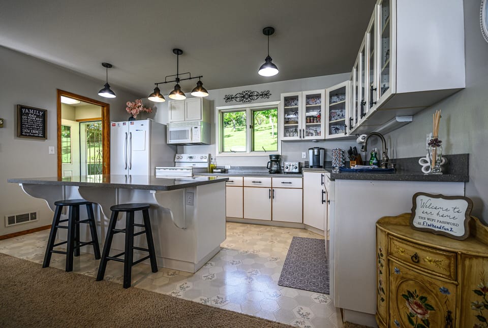 Prep meals in fully equipped kitchen with ample counterspace and all you need.