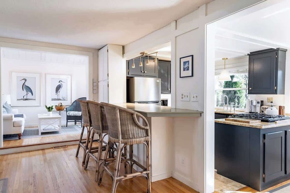Kitchen bar in a spacious open-concept layout, perfect for unwinding and connecting with friends and family