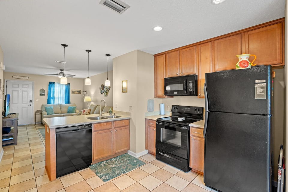 Full kitchen with dishwasher, disposal, cookware, and all utensils included.