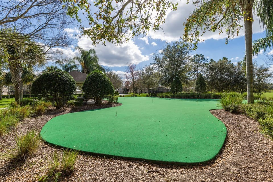 This putting green is right behind the house in the sports park.