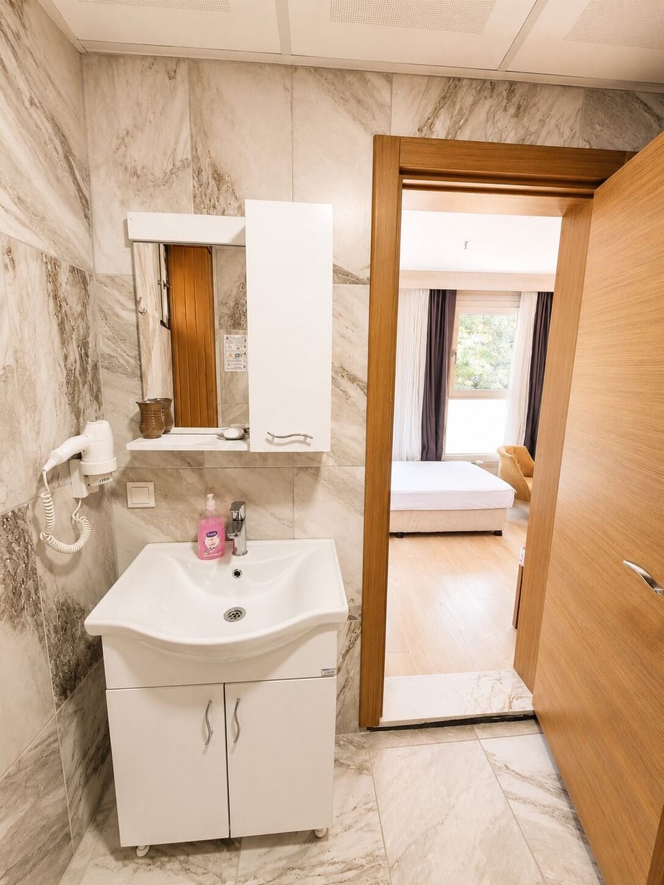 Standard Double or Twin Room | Bathroom | Shower, free toiletries, hair dryer, slippers