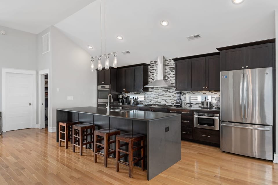 Kitchen Area with Bar Seating on Third Level