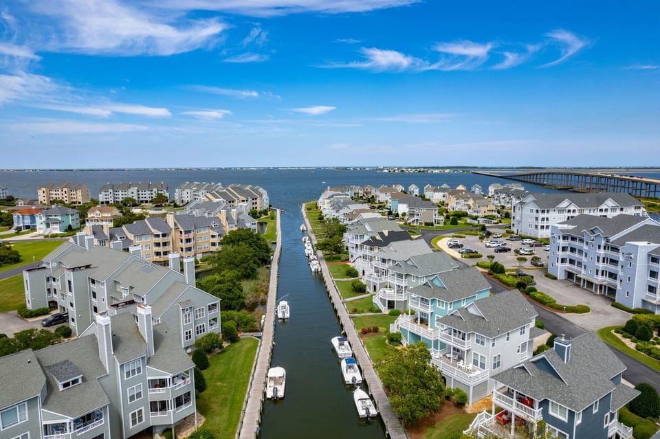 Aerial View of the Canal into the Sound in the Pirate's Cove Gated Community in Manteo