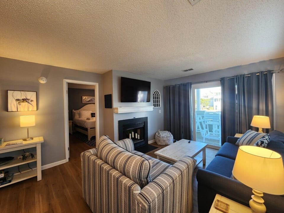 Living Area with Sleeper Sofa and Deck Access