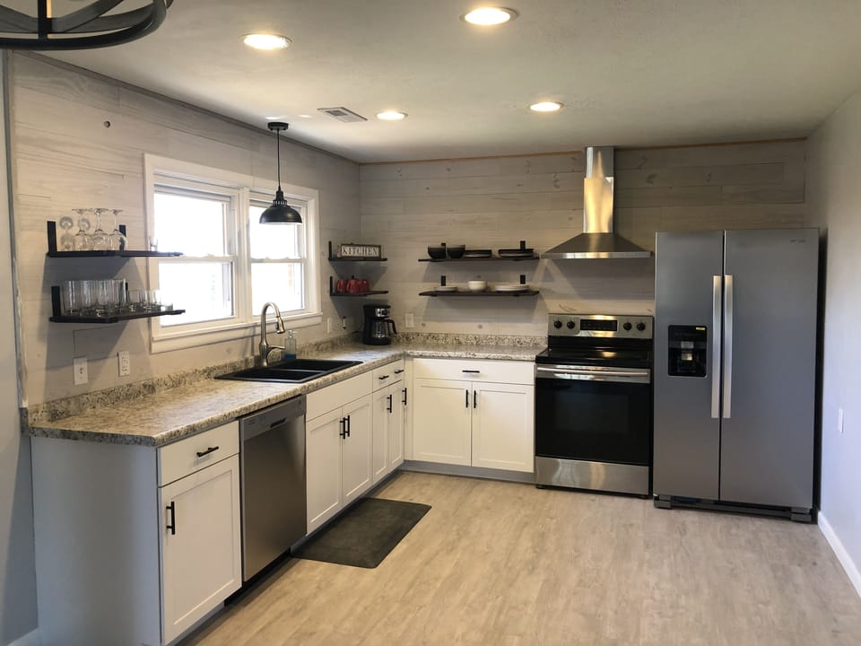 New kitchen, dishwasher and ice maker fridge