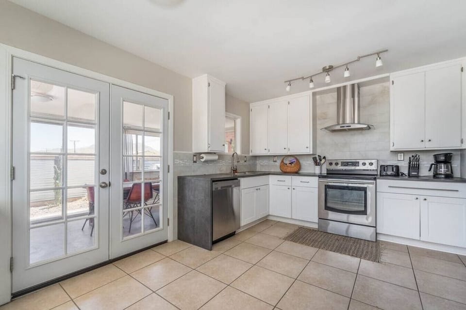 Full kitchen and bonus sunroom with office and Dining