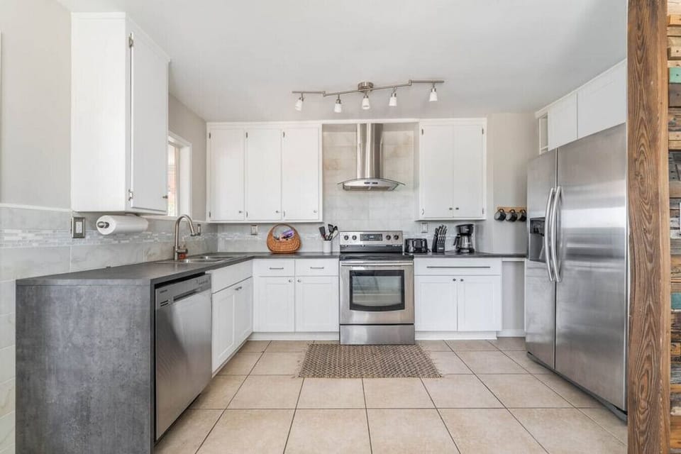 Full kitchen with stainless appliances for cooking at home!