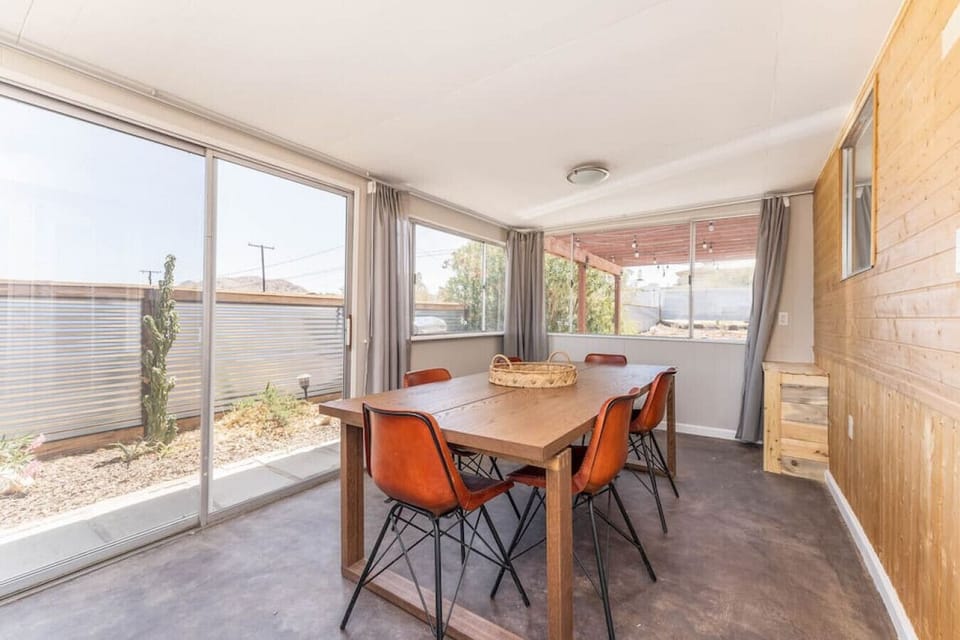 large dinner table in sunroom