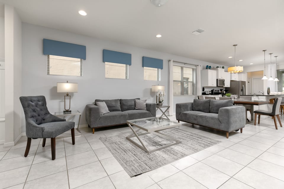 The living room opens to the dining area, creating a bright, inviting space.