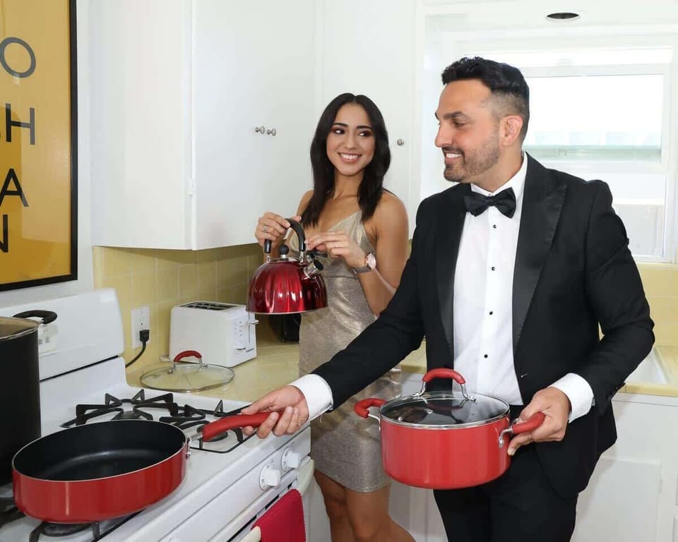 Enjoy the full kitchen with a seating area, a refrigerator, oven, stove, microwave, coffee, creamers, mixers, spices, pots, pans, cooking supplies, cutlery, cups, plates, bowls, utensils, small appliances, and many more essentials.