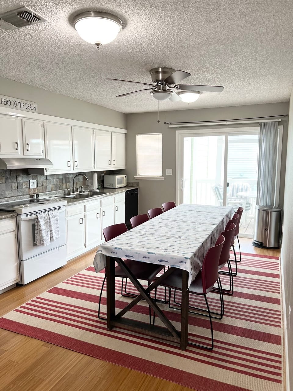 Full sized kitchen with table for eight. 